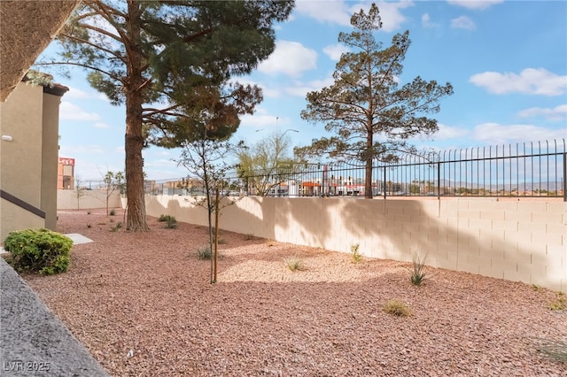 view of yard with a fenced backyard