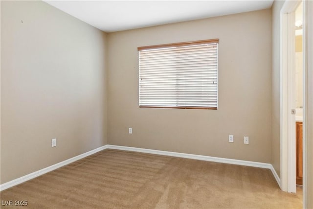 empty room with baseboards