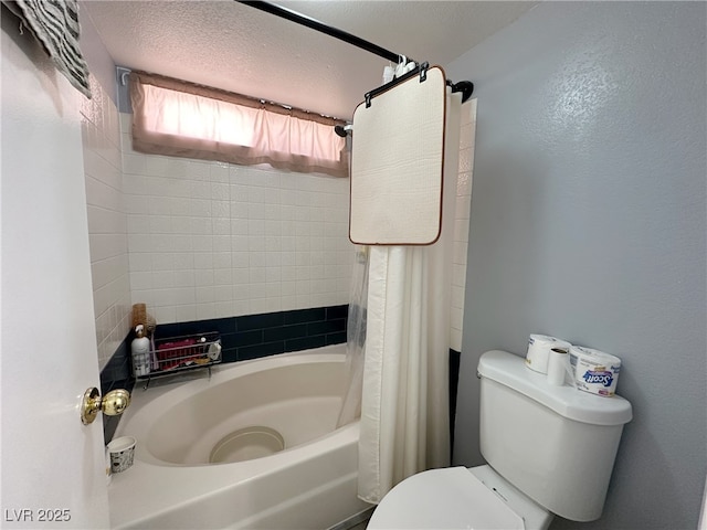 full bathroom with toilet, shower / bath combination with curtain, and a textured ceiling