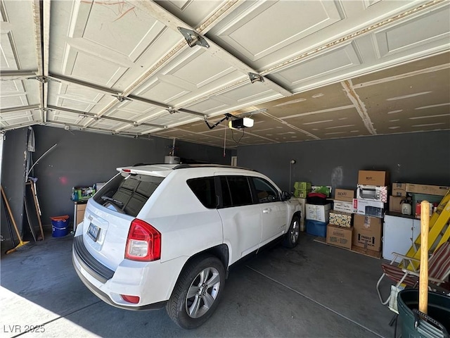 garage featuring a garage door opener