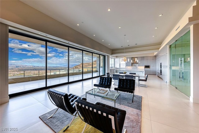 dining area featuring light tile patterned floors and recessed lighting