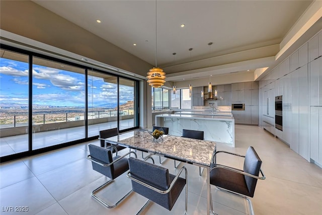 dining space with recessed lighting