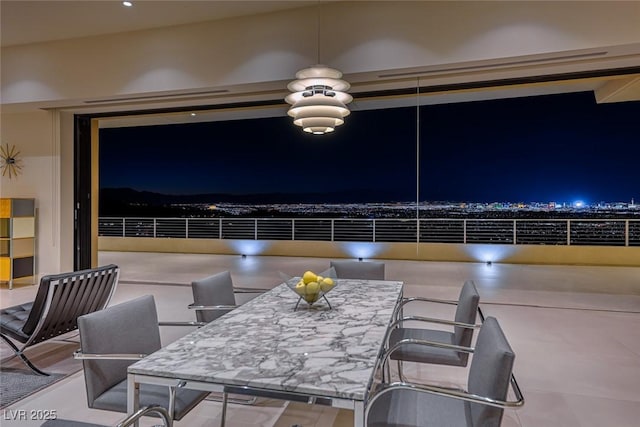 interior space featuring a ceiling fan and outdoor dining space