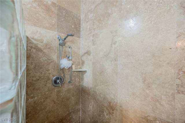 details with a tile shower