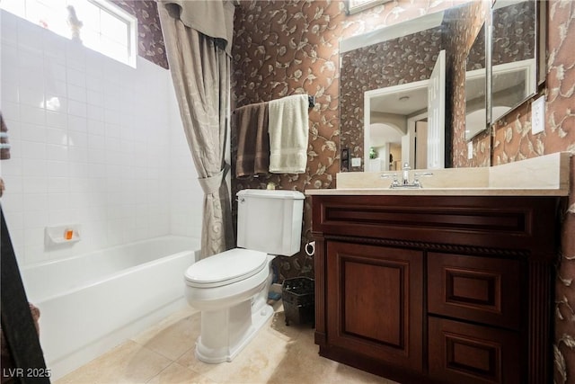 bathroom featuring tile patterned floors, toilet, shower / bath combo, and wallpapered walls