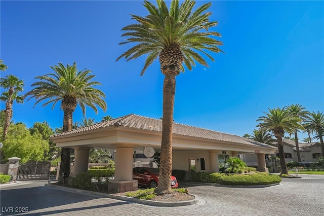 view of building exterior featuring curved driveway