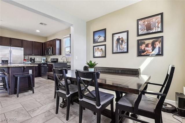 dining space with visible vents