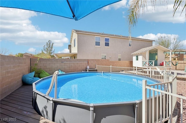 view of pool with a fenced in pool and a fenced backyard