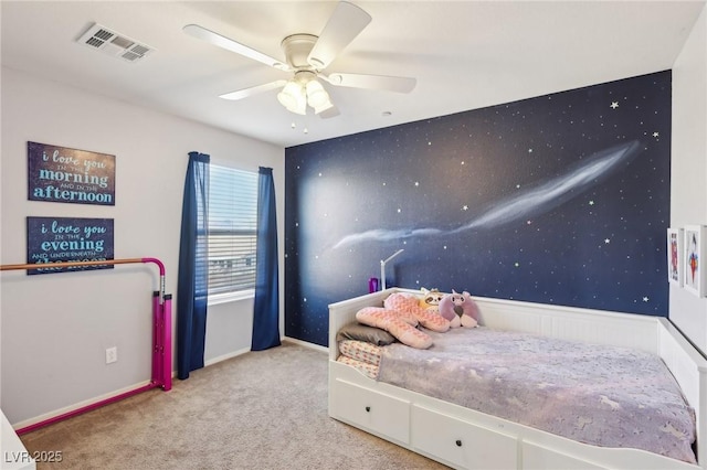 carpeted bedroom with ceiling fan and visible vents