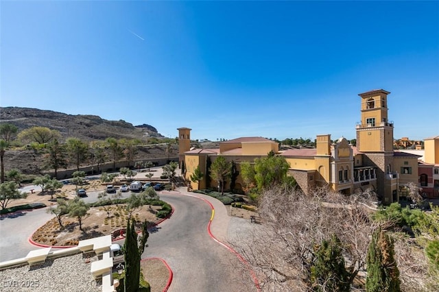 surrounding community featuring a mountain view