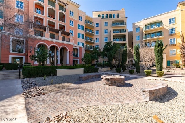 view of property featuring a fire pit