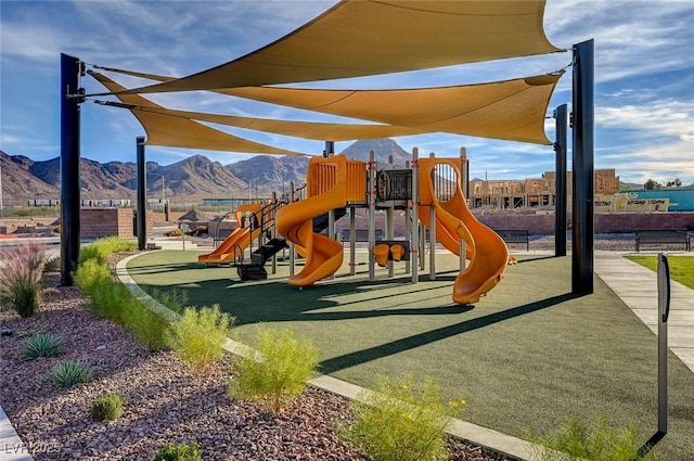 community play area featuring a mountain view