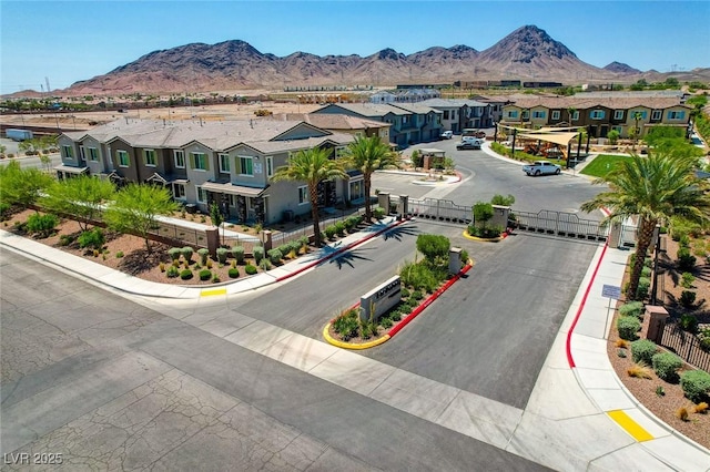 bird's eye view featuring a mountain view and a residential view