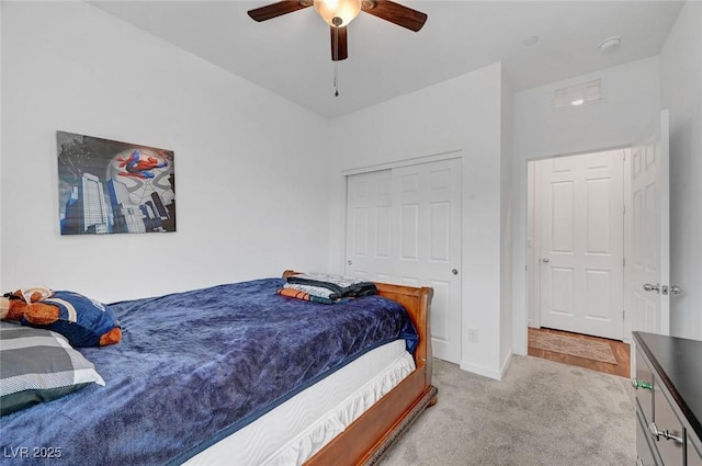 bedroom featuring ceiling fan, carpet floors, and baseboards