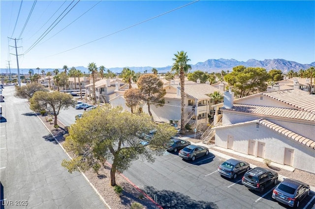 aerial view with a residential view and a mountain view