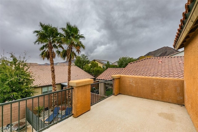 view of patio / terrace with a balcony