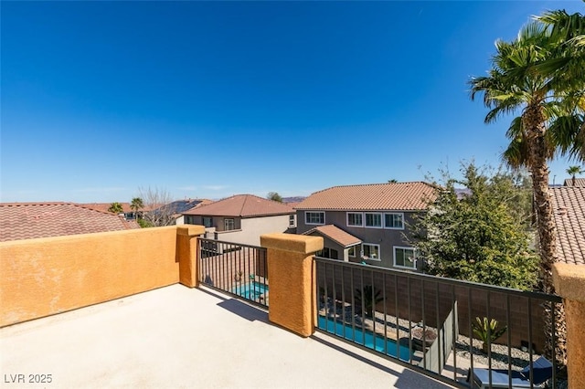 view of patio / terrace featuring a residential view and a balcony