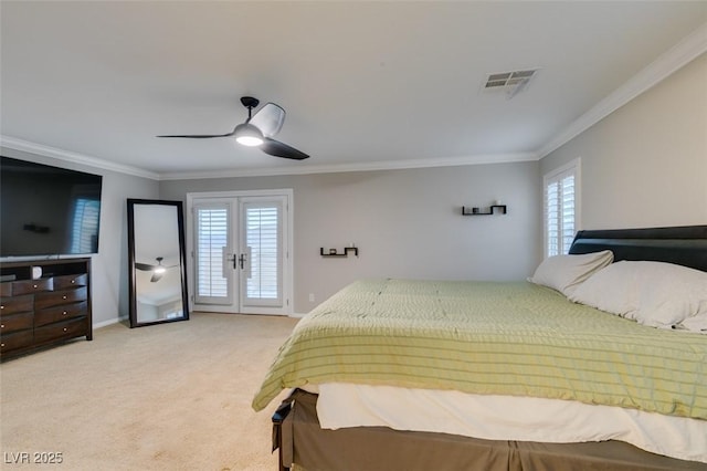 bedroom featuring light carpet, visible vents, access to exterior, french doors, and crown molding