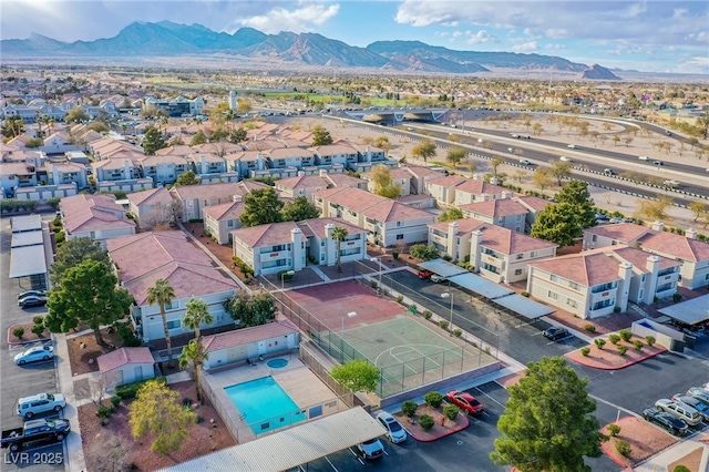 bird's eye view with a residential view and a mountain view