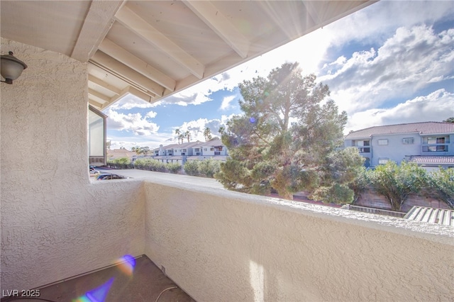 balcony featuring a residential view