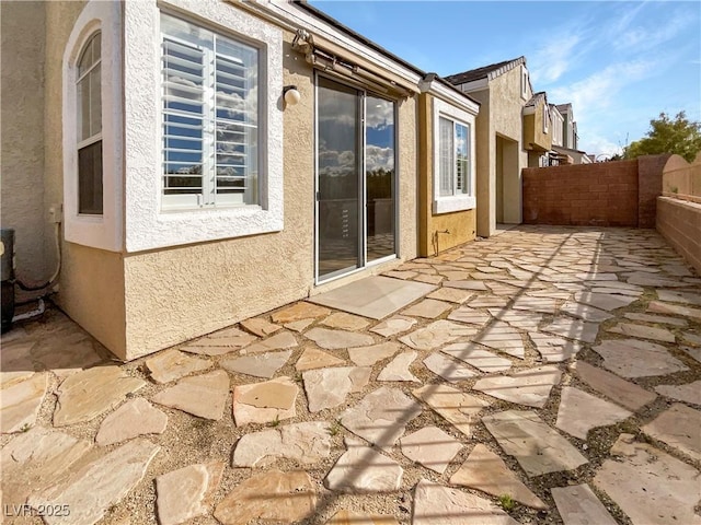 view of patio with fence