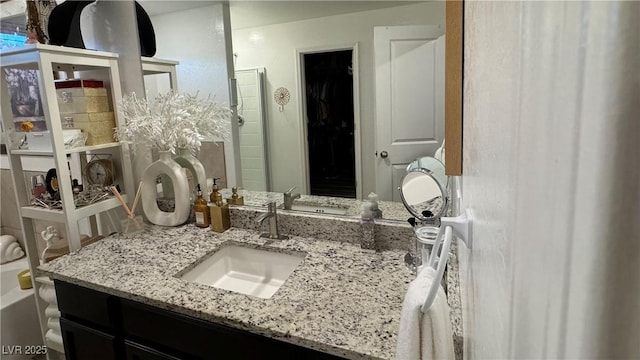 full bathroom with a shower and vanity