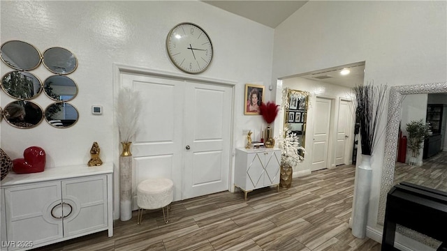 foyer with wood finished floors