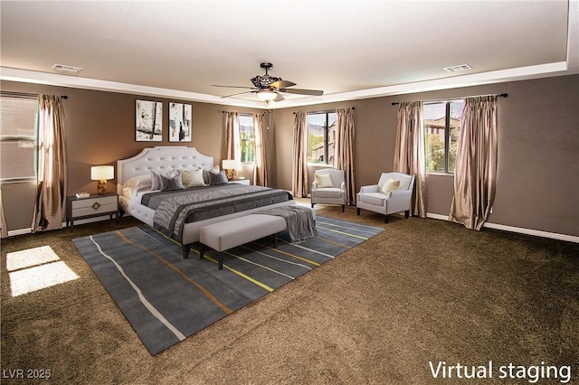 bedroom with carpet floors, a raised ceiling, visible vents, and baseboards