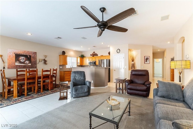 living room with light tile patterned floors, visible vents, recessed lighting, and ceiling fan