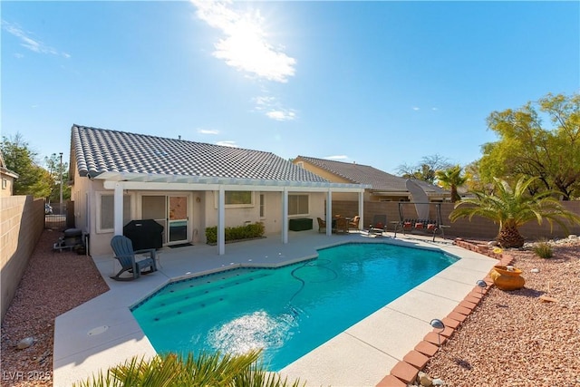 view of pool featuring a patio, a fenced in pool, a fenced backyard, a pergola, and grilling area