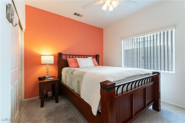 bedroom with visible vents, ceiling fan, baseboards, and carpet floors