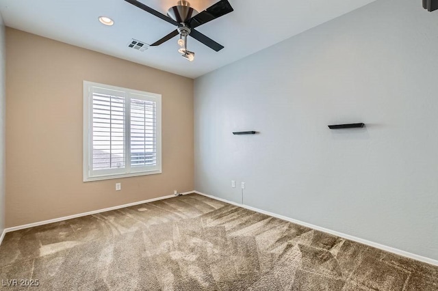 carpeted empty room with visible vents, recessed lighting, baseboards, and ceiling fan