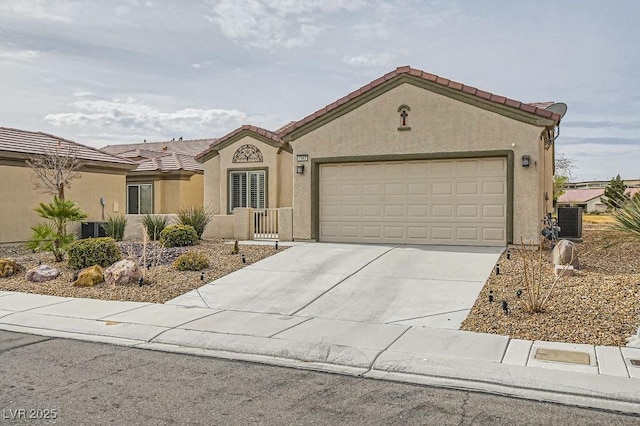 7567 Wingspread St, North Las Vegas, NV 89084 - view of front of property with a tile roof, stucco siding, driveway, a garage, and central AC