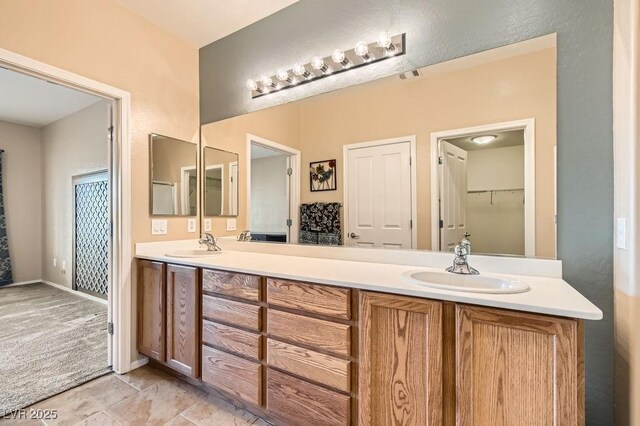 7567 Wingspread St, North Las Vegas, NV 89084 - full bathroom with double vanity