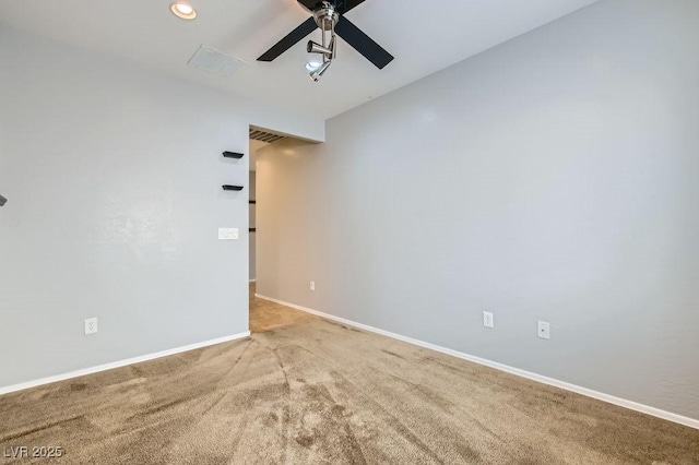 unfurnished room featuring visible vents, ceiling fan, baseboards, and carpet floors