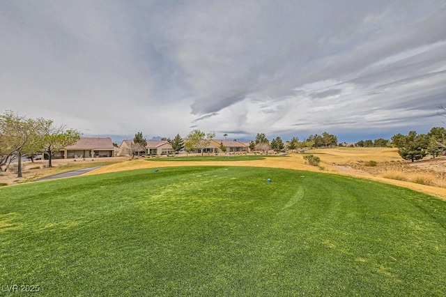 7567 Wingspread St, North Las Vegas, NV 89084 - view of community with a lawn and a residential view