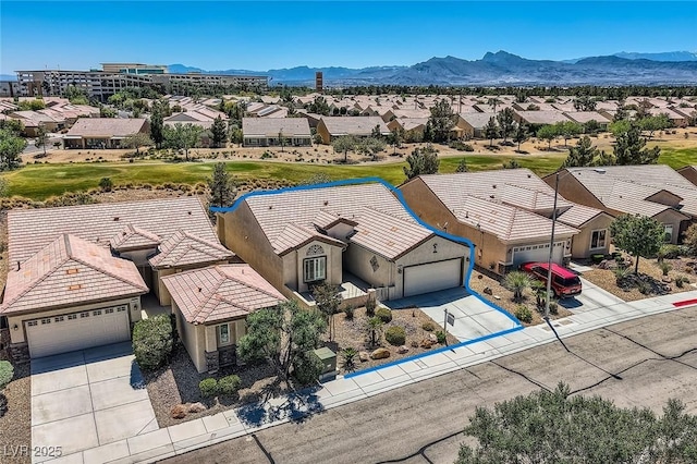 7567 Wingspread St, North Las Vegas, NV 89084 - aerial perspective of suburban area with mountains