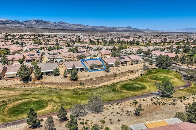 7567 Wingspread St, North Las Vegas, NV 89084 - aerial perspective of suburban area with mountains and a golf club