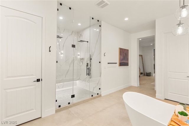 bathroom featuring baseboards, visible vents, a freestanding bath, and a marble finish shower