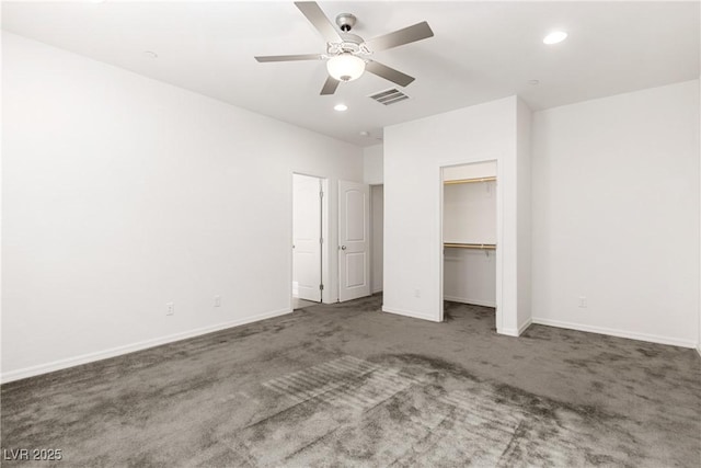 unfurnished bedroom featuring recessed lighting, carpet, visible vents, and baseboards