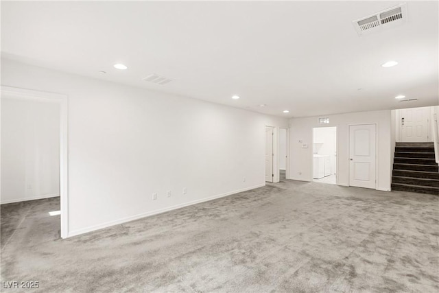 basement featuring washer / dryer, stairway, carpet, and visible vents