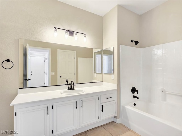 full bathroom with bathtub / shower combination, vanity, and tile patterned flooring