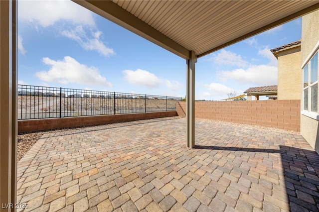 view of patio with a fenced backyard