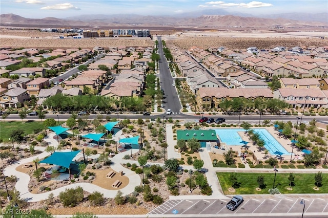 bird's eye view with a residential view and a mountain view