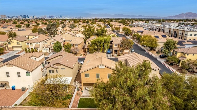 aerial view with a residential view and a mountain view