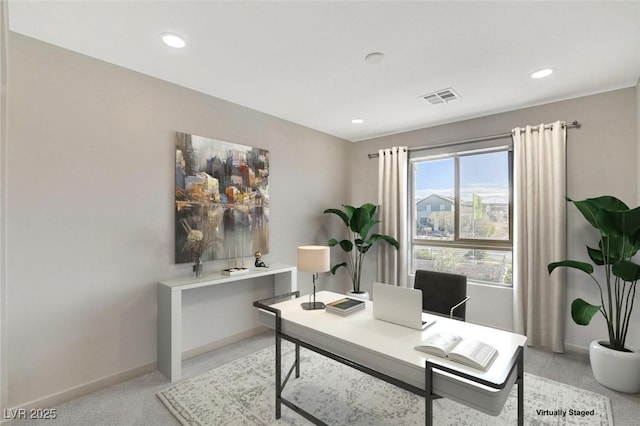 office space with recessed lighting, visible vents, and baseboards