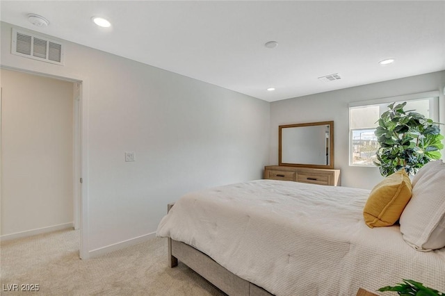 bedroom featuring recessed lighting, baseboards, visible vents, and light colored carpet