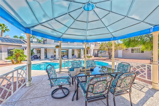 outdoor pool with a patio