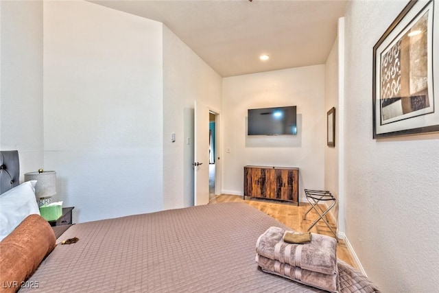 interior space featuring baseboards and wood finished floors