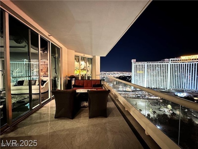 view of balcony at twilight